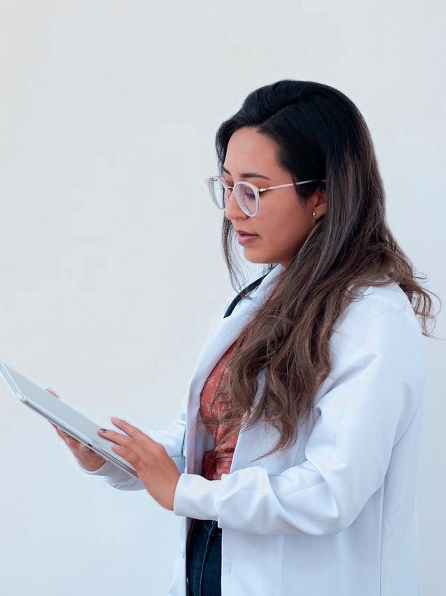 Physician reviewing patient data on a tablet